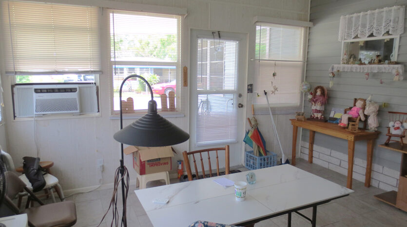 Another View of Enclosed Carport with AC too!